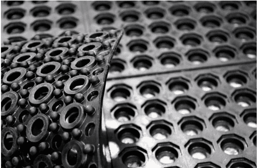 Tapete antifatiga industrial modular en caucho natural — para fábricas, restaurantes y grandes superficies