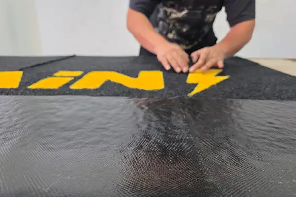 Proceso de vulcanizado para tapete personalizado — fusión permanente en fábrica de tapetes